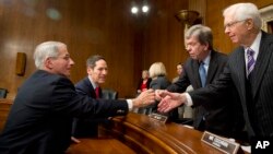 NIH National Institute of Allergy and Infectious Diseases Director Anthony Fauci, left, and CDC Director Thomas Frieden, second from left, shake hands at conclusion of subcommittee hearing on Zika, on Capitol Hill, Feb. 11. 2016. 