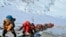 In this May 22, 2019 photo, a long queue of mountain climbers line a path on Mount Everest just below camp four, in Nepal. 