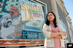 Aurea Montes-Rodriguez, executive vice president of Community Coalition, poses for a portrait outside the Community Coalition offices, April 18, 2017, in Los Angeles.