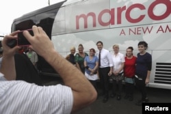 U.S. Senator and Republican presidential candidate Marco Rubio poses for a photo with supporters, during a campaign stop in Hudson, Fla., March 12, 2016.