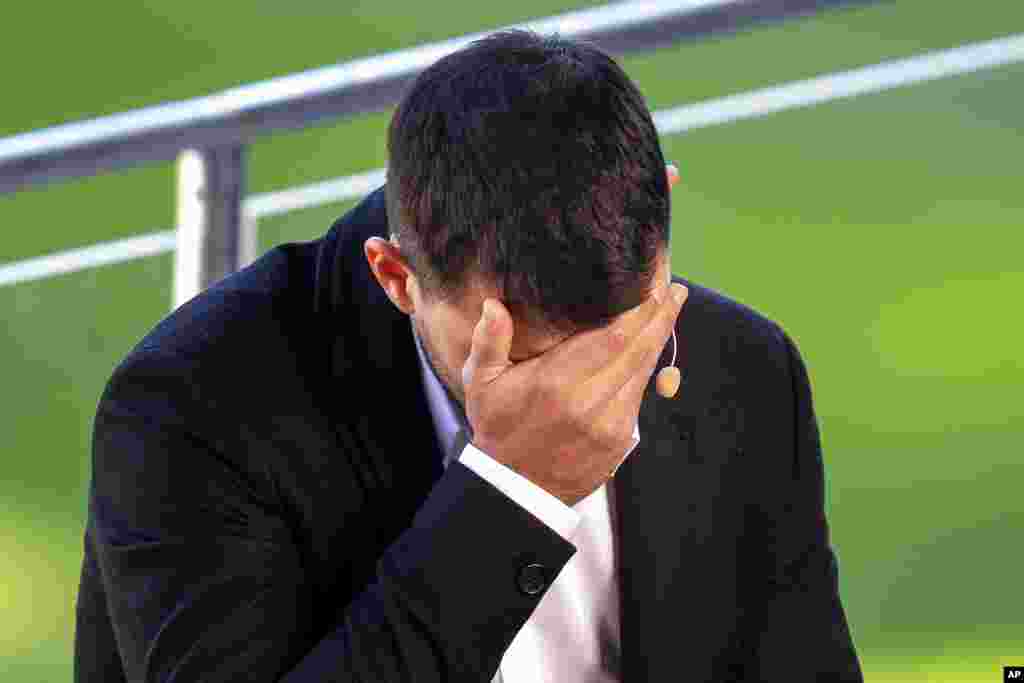 Barcelona soccer player Sergio Aguero cries during a press conference, after announcing his retirement from football due to a heart condition, at the Camp Nou stadium in Barcelona, Spain.