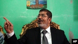 Egyptian presidential candidate Mohamed Morsi, of the Muslim Brotherhood, at his home in the Delta Village, Edwa, April 23, 2012 