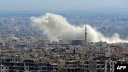 ဆီးရီးယားနိုင်ငံ အရှေ့ပိုင်း Ghouta ဒေသ တိုက်ပွဲဖြစ်ပွားနေစဉ်။