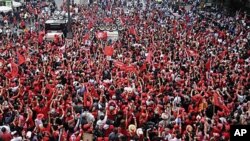 FILE - Protesters from the United Front for Democracy against Dictatorship, or red shirts, hold a rally November 19, 2010, in Bangkok.