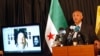 FILE - Abdeltawwab Shahrour, head of the forensic medicine committee in Aleppo, speaks during a news conference in Istanbul, September 10, 2013. Shahrour has said he had documents confirming President Bashar al-Assad's government used chemical weapons.