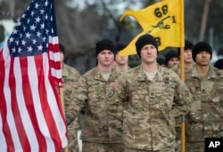 Members of the U.S. Army take part in a NATO battalion welcome ceremony at the Rukla military base west of the capital Vilnius, Lithuania, Feb. 7, 2017.