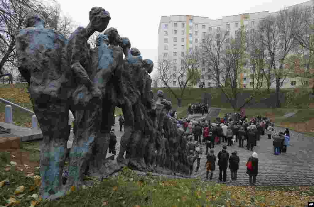 People attend a ceremony to commemorate the 70th anniversary of Minsk Jewish ghetto elimination by the Nazis, Minsk, Belarus. 