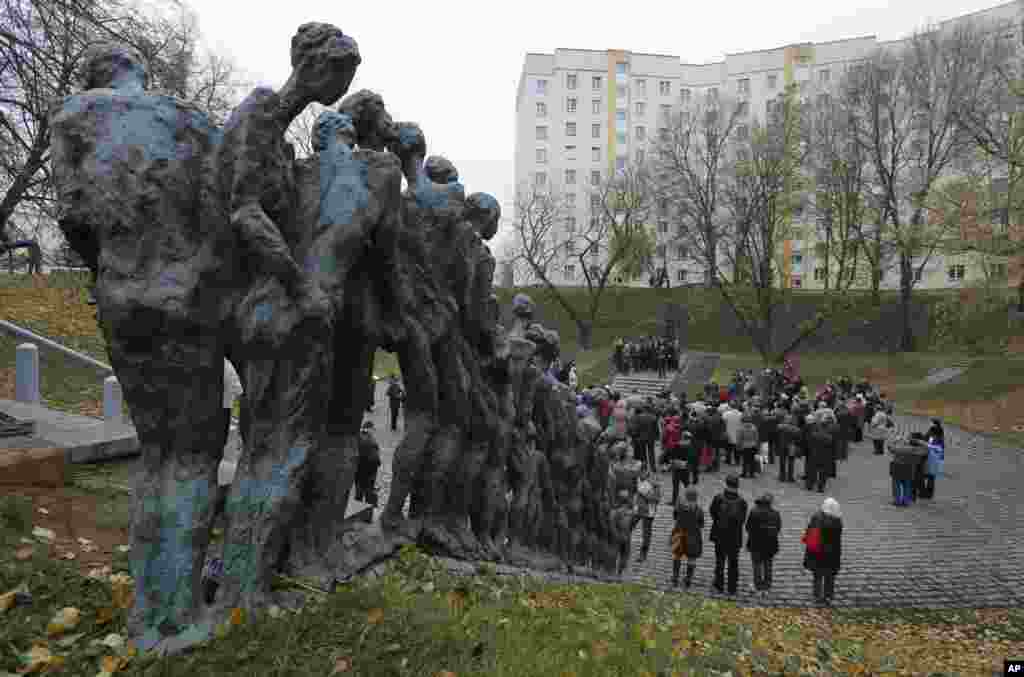 People attend a ceremony to commemorate the 70th anniversary of Minsk Jewish ghetto elimination by the Nazis, Minsk, Belarus.