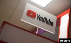 Signage at a YouTube stand at the Labour Party Conference venue in Brighton, Britain, Sept. 26, 2017.