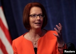 Former Australian Prime Minister Julia Gillard speaks at a policy forum in Washington, Oct. 24, 2013.
