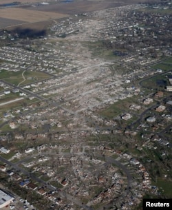 An aerial view shows the path of destruction caused by a tornado that touched down in Washington, Illinois, Nov. 18, 2013.