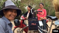 Bong Yein, left, and her two customers, Ang Srey Mach and Ang Pisey, said that they were aware of Obama’s visit and her “Let Girls Learn” program.