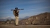 FILE - A Pakistani soldier holds a rocket launcher while securing a road in the town of Khar, in Pakistan's Federally Administered Tribal Areas (FATA), March 2, 2010. The FATA areas now have become part of Pakistan's Khyber Pakhtunkhwa province. 