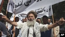 An Afghan elderly man shouts anti-Pakistan slogans during a demonstration in Kabul, Afghanistan, July 2, 2011