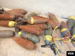 Iraqi forces find bombs, IEDs and other explosive devises as IS is defeated, April 2017. (H. Murdock/VOA)