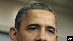 President Barack Obama in the White House briefing room, Dec. 8, 2011.