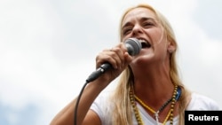 Lilian Tintori, wife of jailed opposition leader Leopoldo Lopez, speaks during a rally against Venezuelan President Nicolas Maduro's government and in support of Lopez, in Caracas, Venezuela, June 8, 2014.