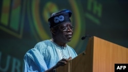 FILE: Asiwaju Bola Tinubu delivers a speech during a rally organized to celebrate his 66th birthday in Lagos, on March 29, 2018. 