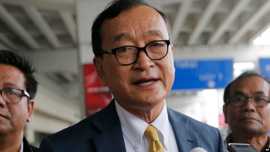 In this photo taken on Nov. 14, 2019, Cambodia's exiled opposition leader Sam Rainsy talks to the media upon arrival at Soekarno-Hatta International Airport in Tangerang, Indonesia.