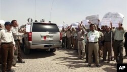 지난 해 9월, 이라크 바그다드에서 시위중인 이란 반체제단체 무자헤딘 할크. (자료사진)
