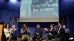 Panel members participate in an event at Bentley University, in Waltham, Mass., where professors and alumni shared some of their worst setbacks to illustrate that even successful people sometimes fail, March 5, 2019. 