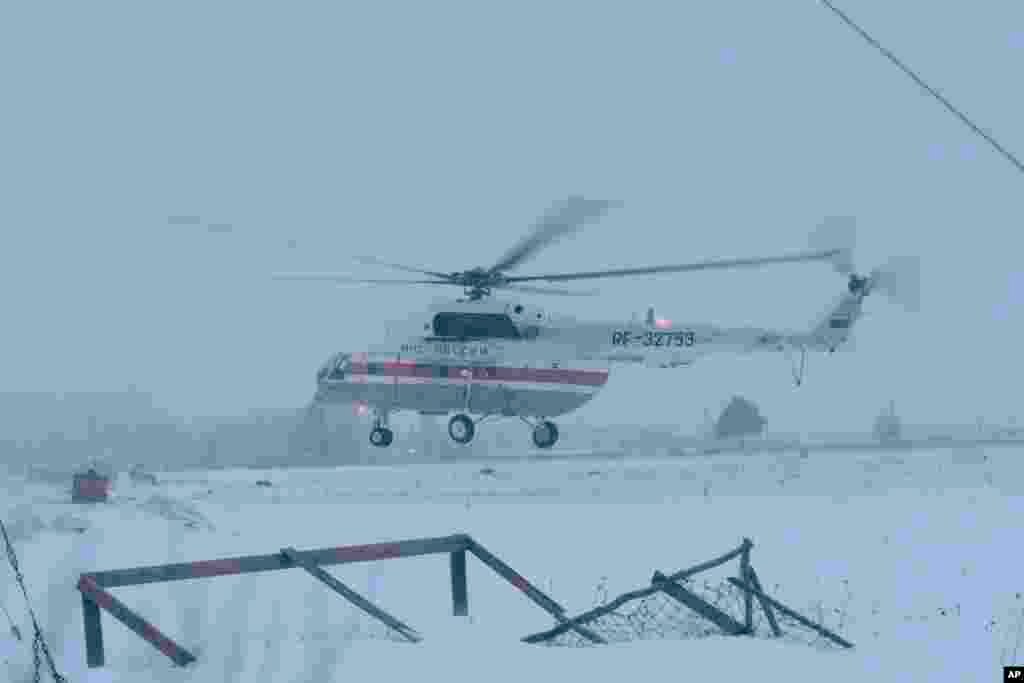 A helicopter takes off near the prison where Mikhail Khodorkovsky was kept in Segezha, near Petrozavodsk, Dec. 20, 2013. 