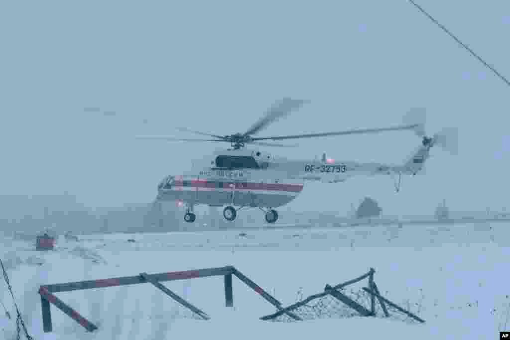 A helicopter takes off near the prison where Mikhail Khodorkovsky was kept in Segezha, near Petrozavodsk, Dec. 20, 2013.