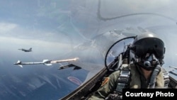 File - An F-16 pilot fires a missile during aTaiwan military drill on May 22, 2019. The U.S. has approved the sale of upgraded F-16 fighters to Taiwan.