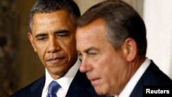 Presiden Obama menegaskan kepada Ketua DPR AS John Boehner (kanan), ia hanya bersedia berunding setelah penutupan operasi pemerintah federal diakhiri (foto: dok).