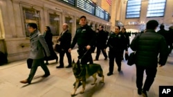 Metro-North Railroad police officers patrol Grand Central Terminal, in New York, March 22, 2016. 