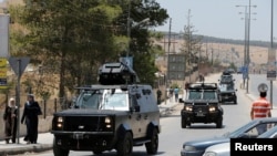 حضور نیروهای امنیتی اردن پس از حمله روز دوشنبه در نزدیکی دفتر اطلاعات ملی اردن. ۶ ژوئن ۲۰۱۶