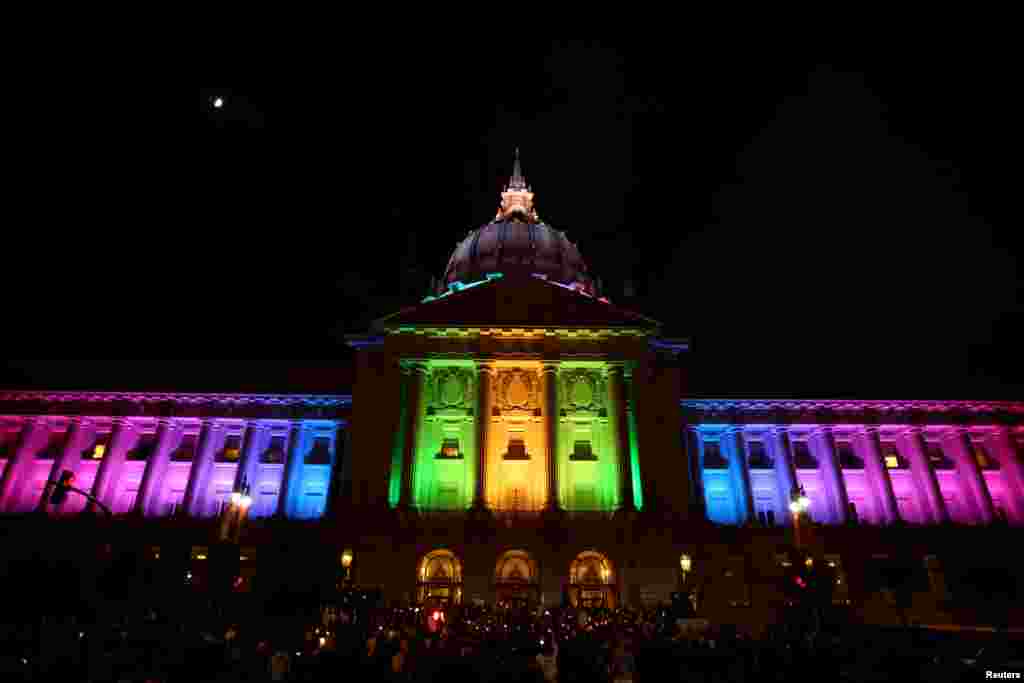 People attend candlelight vigil for Pulse Orlando attack, at City Hall, San Francisco, California, June 12, 2016.