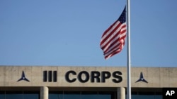 FILE - The Army's III Corps headquarters are seen at Fort Hood, Texas, Nov. 6, 2009. The base has shifted to wind and solar to shield itself from dependence on outside sources.
