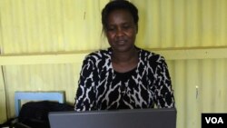 Mary Wahome, program director for Reason to Hope, is pictured in her office. The program has reached over 30,000 people suffering from mental illness in Kenya's rural areas. (R. Ombuor/VOA)