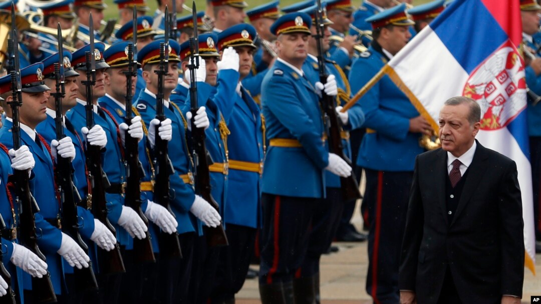 Turkey's President Recep Tayyip Erdogan reviews the honor guard during a welcome ceremony ahead of his meeting with Serbian President Aleksandar Vucic, in Belgrade, Oct. 10, 2017.