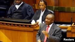 President of South Africa Cyril Ramaphosa addresses MPs after being elected president in parliament in Cape Town, South Africa, Feb. 15, 2018. 