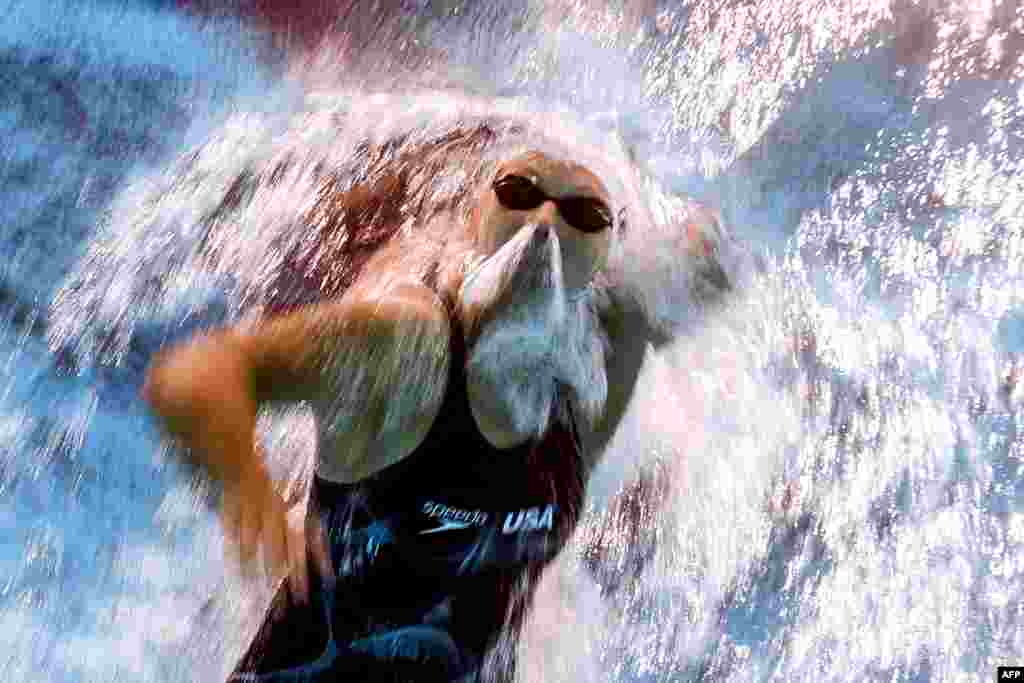 An underwater camera shows Katie Ledecky of the United States competing in a heat of the women&#39;s 800m freestyle during a swimming competition at the 2017 FINA World Championships in Budapest.