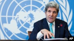 Secretary of State John Kerry gestures during a news conference after he delivered remarks to the United Nations Human Rights Council in Geneva, March 2, 2015.