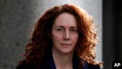 Rebekah Brooks, former News International chief executive leaves the Central Criminal Court in London where she appeared to face charges related to phone hacking, Feb. 19, 2014.