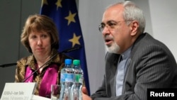 伊朗外交部長扎里夫（右）。