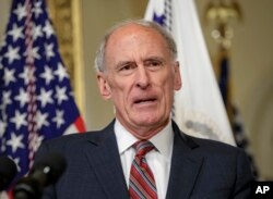 Director of National Intelligence Dan Coats speaks on Capitol Hill in Washington, March, 16, 2017, after being sworn in by Vice President Mike Pence.