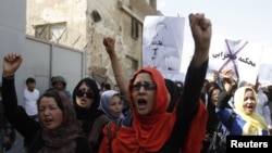 Afghan women march to protest against violence towards women, in Kabul September 24, 2012. 