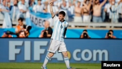 Argentina's Lionel Messi celebrates after scoring against Iran during their 2014 World Cup Group F soccer match at the Mineirao stadium in Belo Horizonte June 21, 2014.