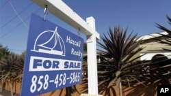 A file photo shows a house for sale in San Diego, California, June 2012.