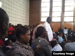 Some Zimbabweans attending a court case in which 67 activists are facing charges of engaging in alleged violent activities.