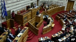 Grčki parlament u toku odličivanja o Prespanskom sporazumu (Foto: Panayiotis Tzamaros/InTime News via AP)