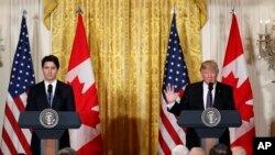 President Donald Trump and Canadian Prime Minister Justin Trudeau participate in a joint news conference in the East Room of the White House in Washington, Feb. 13, 2017. 