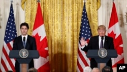 President Donald Trump and Canadian Prime Minister Justin Trudeau participate in a joint news conference in the East Room of the White House in Washington, Feb. 13, 2017. 