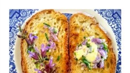 Photographer and gardener Roshani Kothari mixes sage flowers with butter to put on top of bread. (Photo: Roshani Kothari)