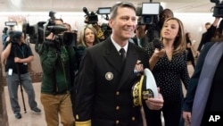 Rear Adm. Ronny Jackson, President Donald Trump's choice to be secretary of the Department of Veterans Affairs, leaves a Senate office building, on Capitol Hill, Apr. 24, 2018. 